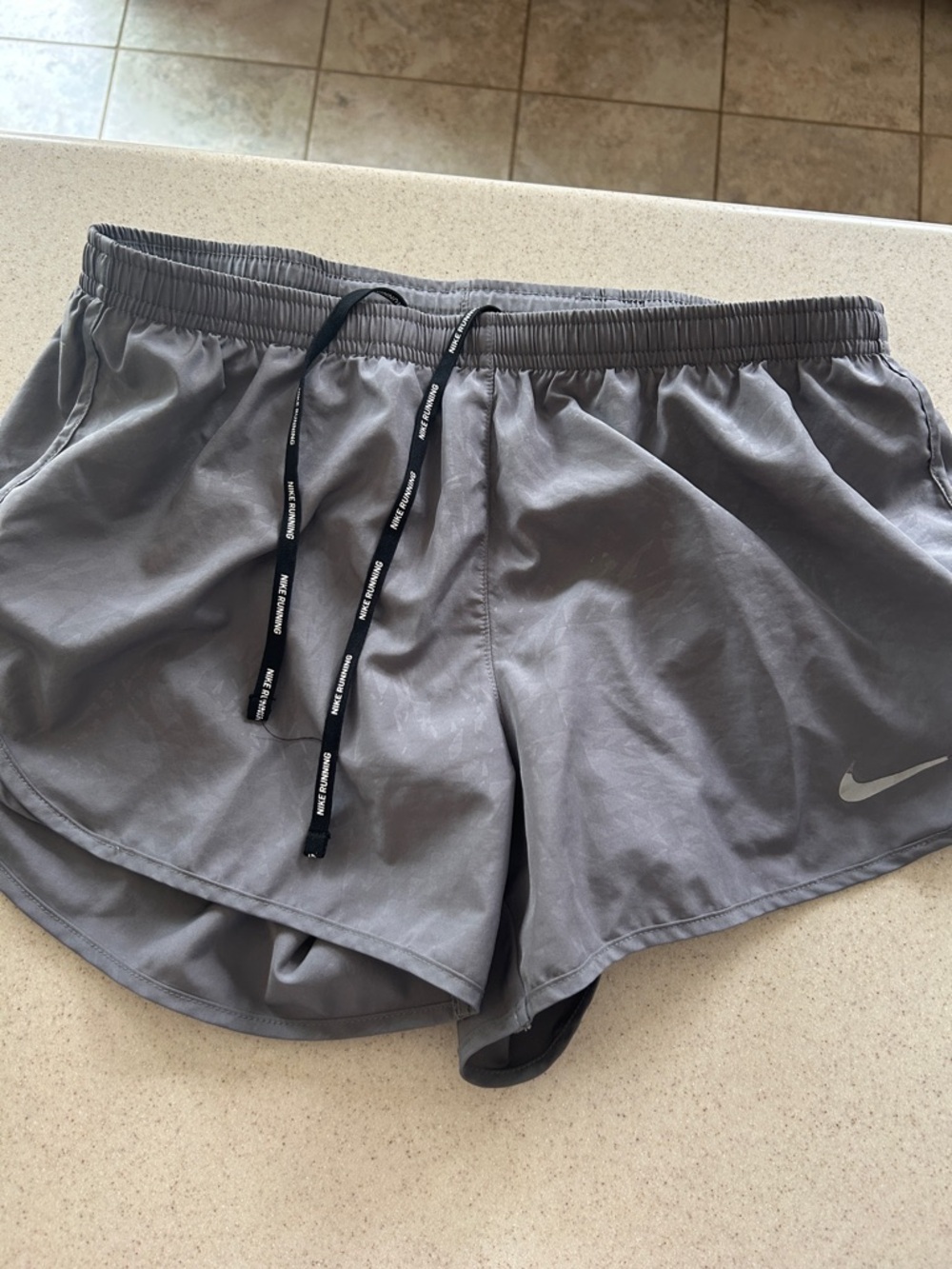 Nike Women's Gray Athletic Shorts with Black Drawstring